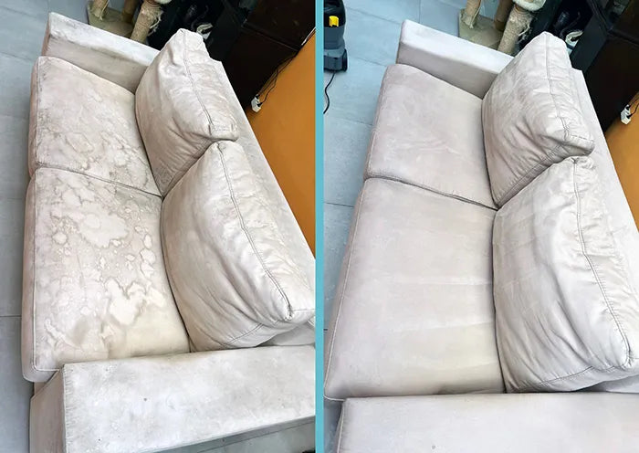Cremekleurige zetel met vochtkringen behandeld